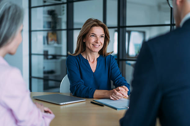 istock Group of business persons talking in the office. 2254861702