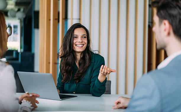 istock Group of business persons talking in the office. 2254863932
