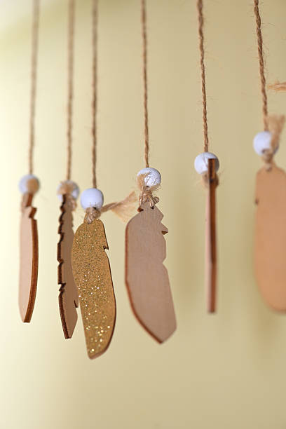Wooden Ornaments Hanging on Strings