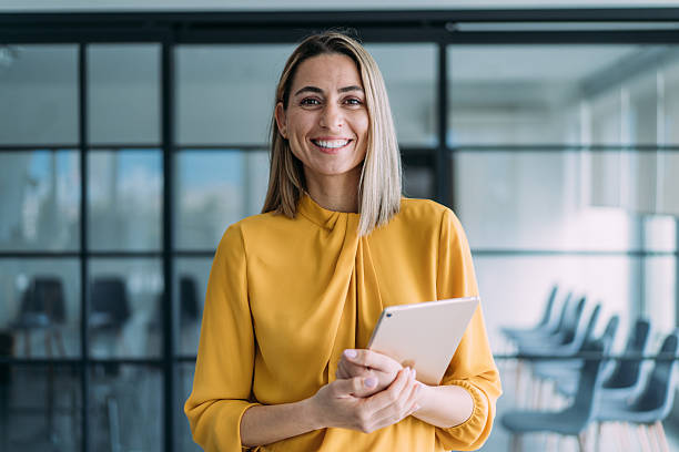 istock Confident businesswoman in modern office. 2254868107