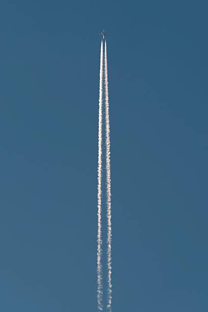 White Clouds Blue Sky Fluffy Sun Flare Airplane Trail Sunny Daytime Texture Background