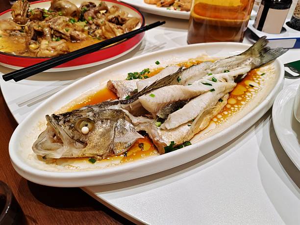 istock STEAMED SEA BASS WITH GINGER AND SPRING ONION 2254875089