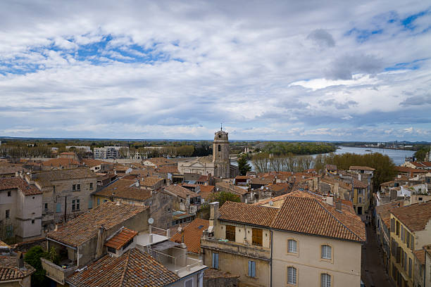 istock Terracotta rooftops and river view in Arles 2254877750