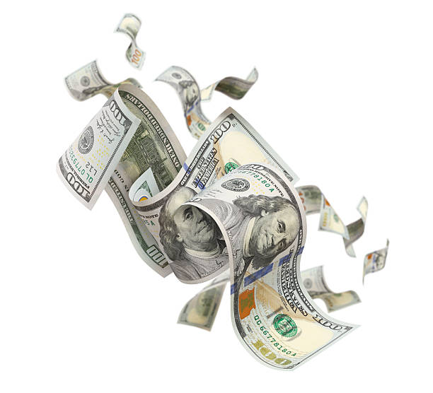 istock Flying hundred dollar banknotes, isolated on white background 2254877934