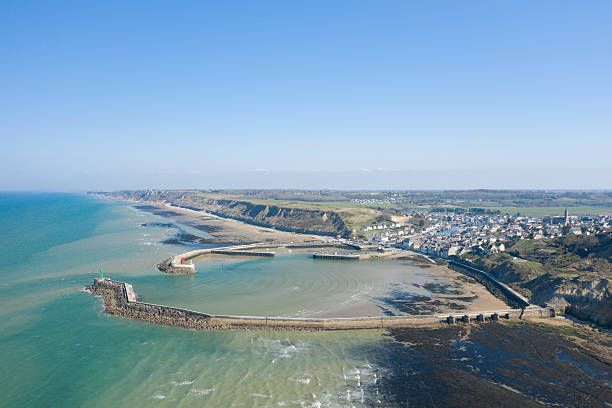 istock Coastal harbor and cliffs, Port en Bessin aerial 2254879562