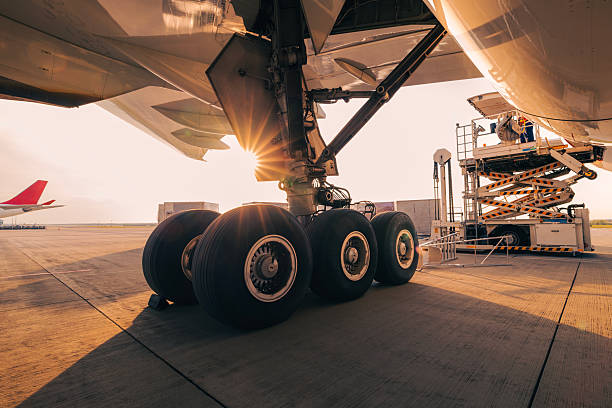 istock Preparation of cargo airplane before flight at airport 2254879579