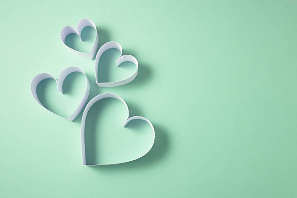 Valentines day concept with heart shaped papers