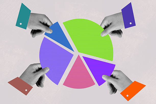 Human hands taking pieces of multi colored pie chart pieces on beige  background