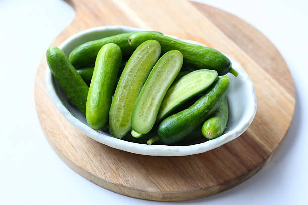 istock Fresh green organic mini baby bucumbers 2254884028
