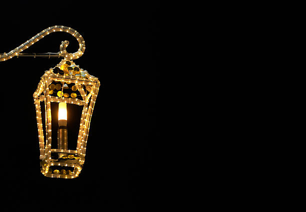 A street lamp on a black background with space for text