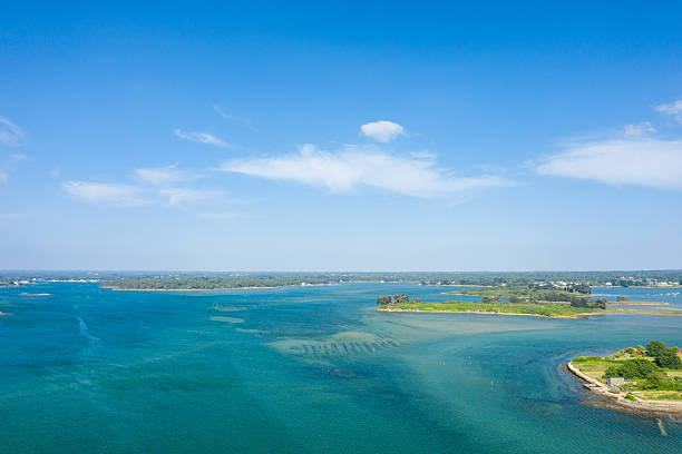 istock Turquoise estuary and green islets under blue sky 2254888270