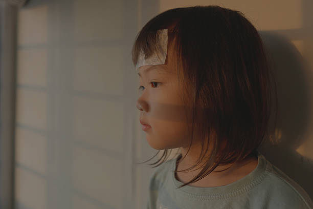 Young Asian Chinese Toddler having a fever