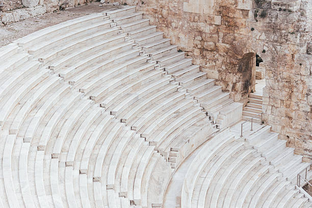 A stone-built amphitheater situated in Volax, Tinos, Greece, offering panoramic views of the surrounding landscape