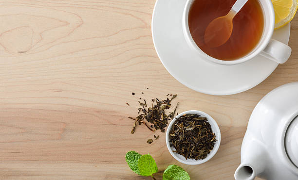 istock Detail of black tea with lemon in white ceramic cup 2254889264