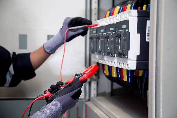 istock Electrical tests industrial electrical circuits with a multimeter in the control terminal box. 2254890775