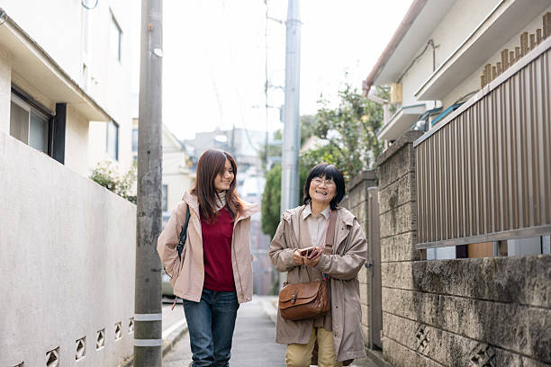 istock Family walking residential district 2254899094