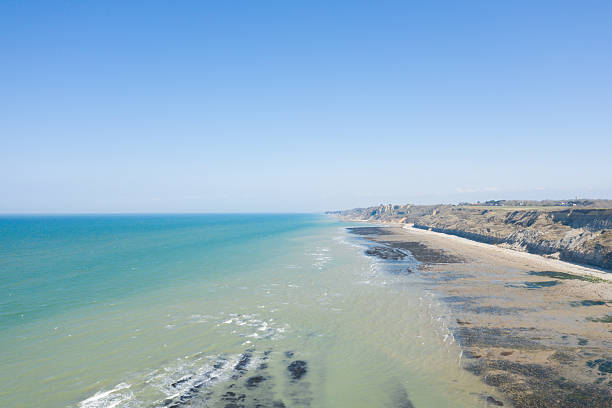 istock Expansive sandy beach and cliffs, Port en Bessin 2254908993