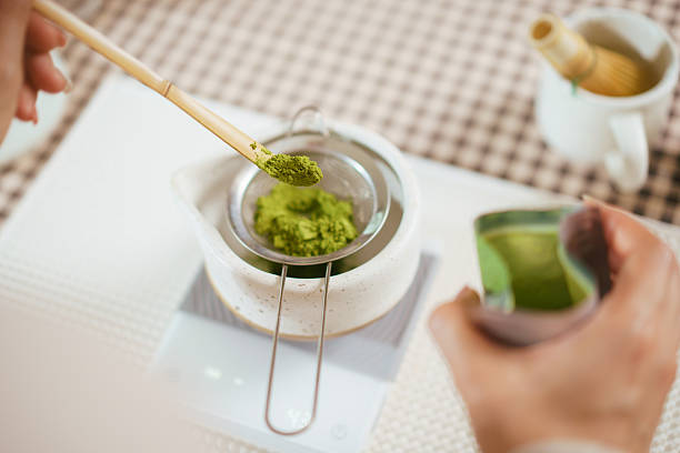 Top view of preparing matcha green tea powder