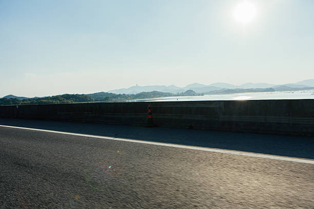 out focus highway lanes with arrows as background