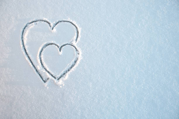 Heart drawn on snow.