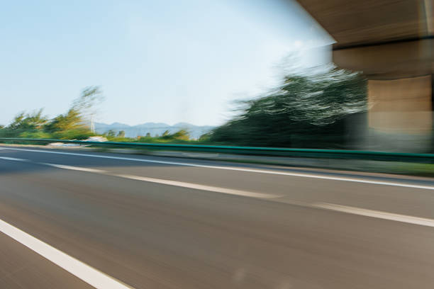 Urban cityscape view from bridge ground perspective with distant CBD skyline, wide copy space for car advertising background, modern city scenery suitable for commercial promotion, transportation branding, outdoor advertising design and minimalist layout