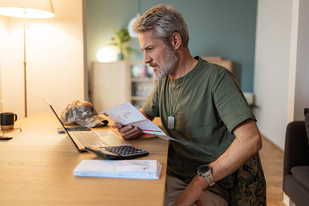 istock Mature military man managing home finances 2254919379