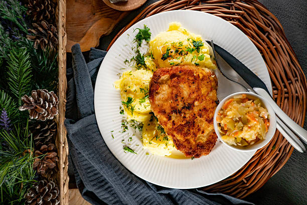 istock Pork chop with potatoes. 2254930150
