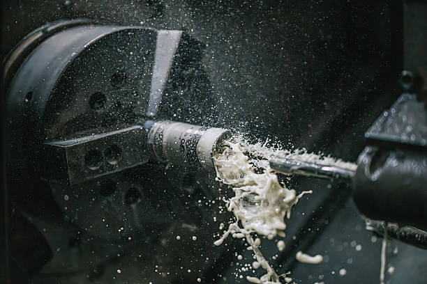 istock CNC Lathe Turning With Coolant Splash During Precision Metal Machining Inside Factory 2254931537