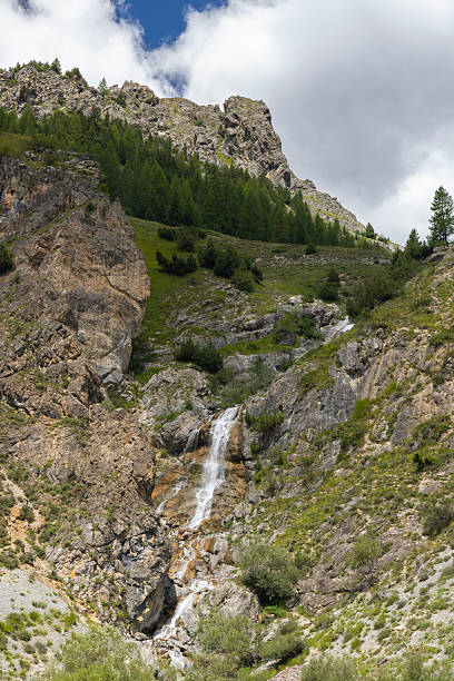 istock Waterfall cascading down rocky mountain near Argentera, Piedmont 2254936162