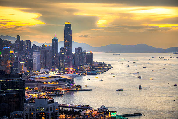 istock Hong Kong Skyline At Sunset Over Victoria Harbour 2254951977