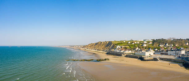 istock Seaside village and cliffs at Arromanches-les-Bains 2254952253
