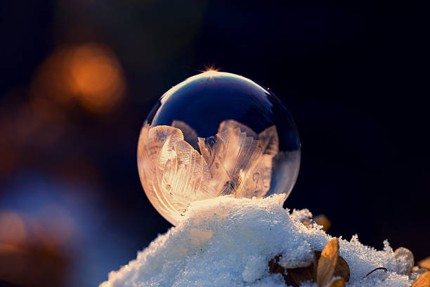 istock Delicate Frozen Bubble with Intricate Frost Patterns 2254953474