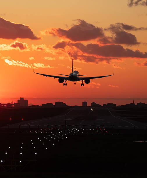 istock Plane lands at an airfield at the sunset 2254955150