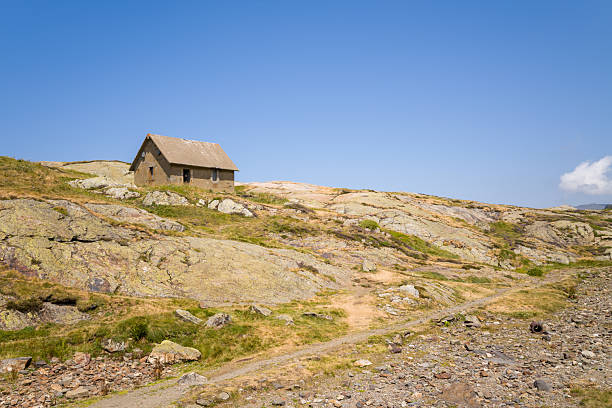 An old thatched roof small house in a hillside in Norway