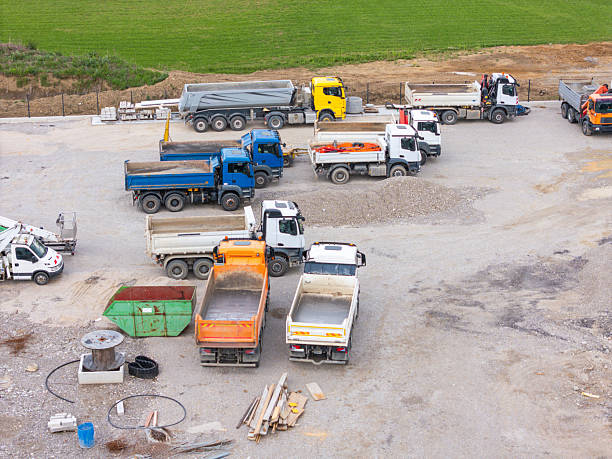 istock Aerial View of Construction Site with Trucks and Equipment 2254962017