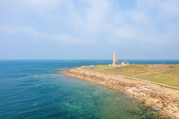 istock Lighthouse on rocky coast with turquoise sea, Cap Levi 2254965213