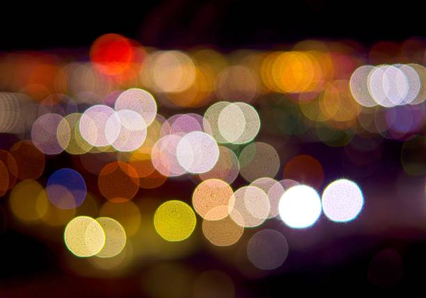Colorful soft focus festive lights for use as a design abstract.