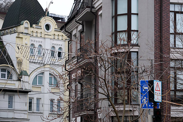 Elegant buildings stand side by side, blending history with contemporary city life. Andreevsky Uzviz, Kyiv, Ukraine. December 8, 2025.