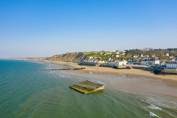 istock Sunny coastline and cliffs at Arromanches-les-Bains 2254967289