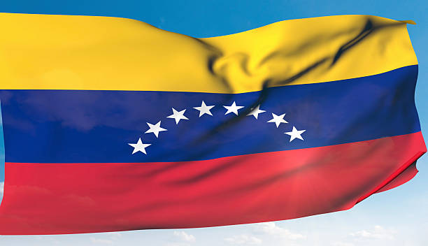 Venezuelan flag waving in the blue sky. / You can see the animation movie of this image from my iStock video portfolio. Video number: 2254967874