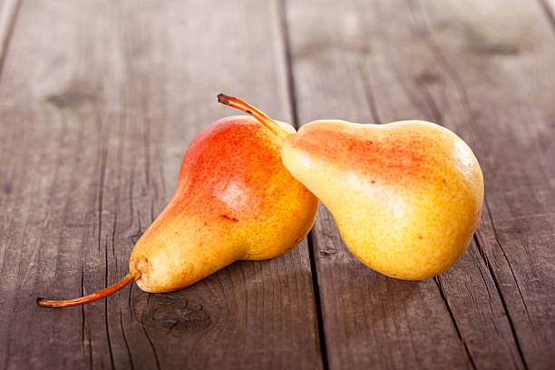 Ripe Bosc Pears On Wood