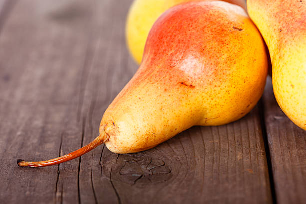 Ripe Bosc Pears On Wood