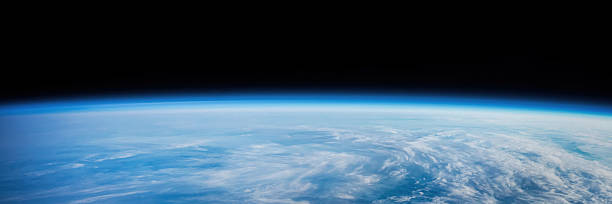 istock Earth surface view from orbit in space. Blue planet. Elements of this image furnished by NASA 2254974453