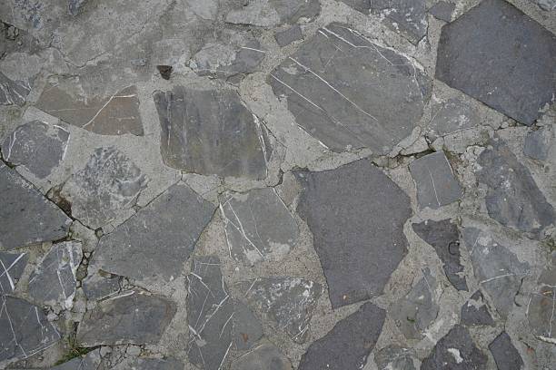 Travel romania transilvania targu mures irregular grey stone slabs creating a rustic textured paving surface with mortar joints