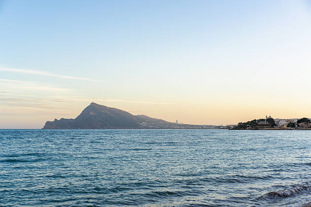 Altea coastline landscape with Sierra Helada mountain at sunset in Spain