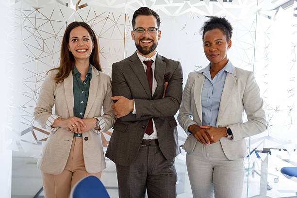 istock Diverse business team smiling in modern office, celebrating successful partnership and corporate collaboration 2254979179