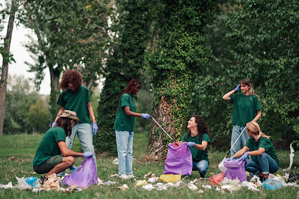 istock Volunteers cleaning up park for environmental protection 2254979465
