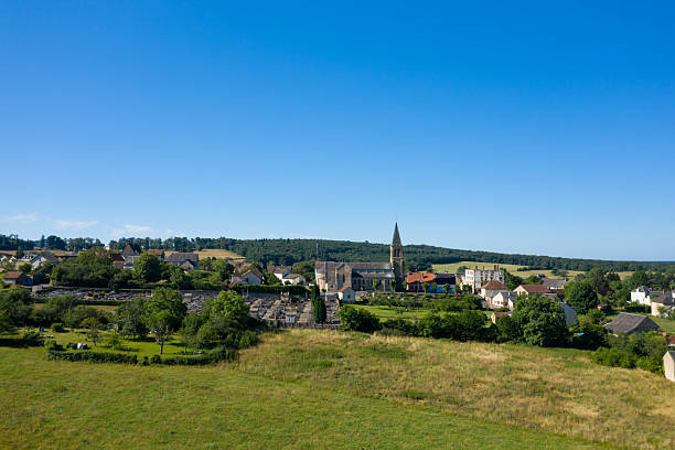 istock Village skyline with church and open fields 2254982019