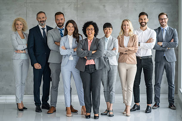istock Earnest business group striking a confident pose in suits 2254983196