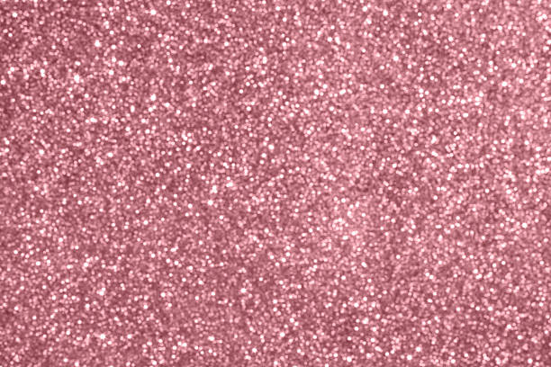 istock Abstract rose gold pink glitter sparkle texture background 2254983261